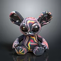 Iridescent Alien Toy Figure With Large Eyes Big Ears And Colorful Glossy Surface