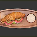 Fresh Croissant Sandwich With Tomato Lettuce On Wooden Tray And Side Cream Sauce Bowl