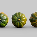 Three Fresh Green And Yellow Striped Squash Vegetable Arranged On Gray Background