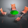 Green Round Outdoor Table With Four Wrought Iron Chairs And Orange Striped Cushions