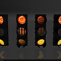Four Illuminated Outdoor Traffic Lights With Black Housing And Red Yellow Green Lamps