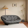 Modern Grey Multi Person Sofa with Arched Design Button Tufted and Floor Lamp Potted Plant