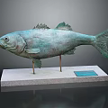 Elegant Home Furniture Display Featuring Bronze Fish Sculpture On Stone Base