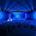 Modern Conference Venue With Blue Lighting Large Screen And Round Tables