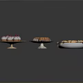 Delicious Assorted Desserts Including Cupcakes Pastries And Muffins On Decorative Plates