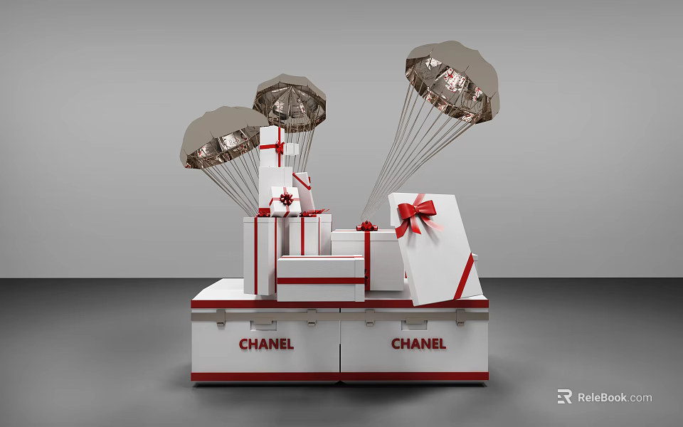 Gift Boxes With Metallic Parachutes And Red Bows On Chanel Display Base 3d model 