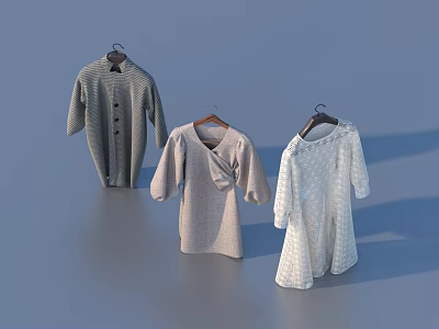 Three Knit Sweater Style Clothes in Gray Light Gray and White Hanging on Hangers 3d model
