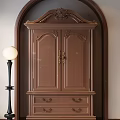 Elegant Classical Brown Wooden Wardrobe With Intricate Carvings And Golden Handles