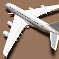 White Airplane Model With Four Engines Wings And Fuselage On Brown Background