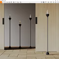 Elegant Black Floor Lamps With Candle Shaped Design In Modern Interior Setting