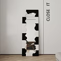 Wavy Black And White Mirror Frame With Close Text Beside Gray Cushion Reflection