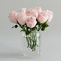 Decorative Ornament Set with Pink Roses in Transparent Glass Vase and Green Leaves
