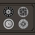Four Decorative Ceiling Medallions With Intricate Patterns On Gray Wall