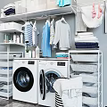 Laundry Room Organization With Washing Machines Hanging Clothes And Storage Shelves