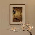 Brown Framed Abstract Painting on Beige Wall with Black Gold Elements and Beige Flower Branch