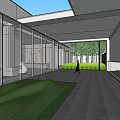 Modern Sales Office Building With Glass Facade Flat Roof And Green Lawn Surroundings