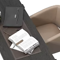 Dark Wood Desk Setup With Modern Lamp Leather Notebook Open Book And Beige Chair