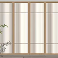 Minimalist Wooden Sliding Doors With Vertical Stripes And Green Plant Accent