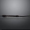 Red Bladed Weapon With Black Rope Wrapped Handle And Leather Cord Tail