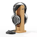 High Quality Over Ear Headphones on Wooden Stand with Sleek Metallic Black Design