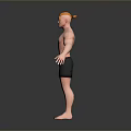 A Shirtless Muscular Man With Blonde Hair In Black Shorts Standing Barefoot