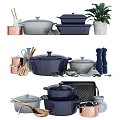 Colorful Cookware Set With Blue Gray Copper Pots Spatulas Salt Pepper Shakers And Decorative Plant