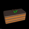 Delicious Layered Chocolate Yellow Cake With Green Leaf And Chocolate Decoration