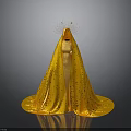 Woman In Yellow Sequined Robe With Head Decoration Against Gray Background With Reflective Floor
