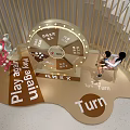 Fun Photo Check-in Spot Featuring Large Interactive Wheel And Cartoon Character For Kids