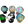 Collection of Various Colored Decorative Globes With Different Styles And Bases