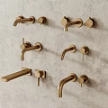Modern Golden Wall Mounted Bathroom Faucets on Textured Grey Wall