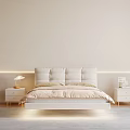 Modern Bedroom Interior With Padded Headboard Beige Bedding Nightstand Lamp And Green Plant