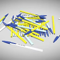Pile of Blue Yellow and White Ballpoint Pens Scattered on Gray Background