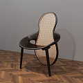 Modern Dining Chair With Woven Design And Dark Frame On Herringbone Wooden Floor