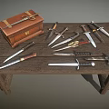 Vintage Leather Case And Multiple Daggers On Rustic Wooden Table 3d model