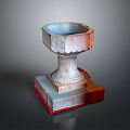 Classic Stone Carved Decorative Vessel With Intricate Patterns And Red Base