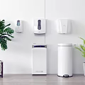 Modern Household Daily Use Appliances With White Wall Mounted Dispensers Trash Bins And Green Plants