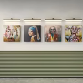 Four Diverse Portrait Paintings Display On White Wall With Striped Base And Lighting