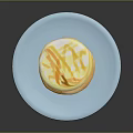 Stack of Fluffy Pancakes Topped with Yellow Sauce on Blue Plate