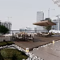 Rooftop Terrace Design with Outdoor Dining Set Umbrella and City Skyline View