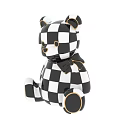 Black And White Checkered Toy Bear With Shiny Surface And Golden Foot Decorative Details