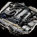Close Up View Of Car Engine With Intake Pipes Exhaust System And Battery Components