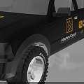 Black Pickup Truck with Yellow Stripes Material Haul Lettering and White Rims