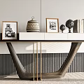 Modern Wooden Console Table With Framed Pictures Woven Basket And Decorative Items On Striped Backdrop