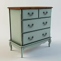 Light Blue Vintage Chest of Drawers With Metal Handles and Curved Legs