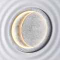 Minimalist Circular Wall Lamp With Illuminated Moon Surface Texture And White Wall 3d model