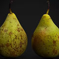 Fresh Ripe Pears Yellowish Green with Brown Spots on Black Background