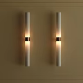White Cylindrical Wall Lamps With Metal Ring On Beige Wall Decorative Border