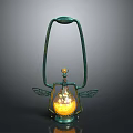 Ornate Green Metal Lantern With Handle Transparent Glass Globe Wing Shaped Decorations And Yellow Light