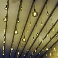 Multiple Hanging Pendant Lights With Vintage Bulbs Creating Warm Interior Glow